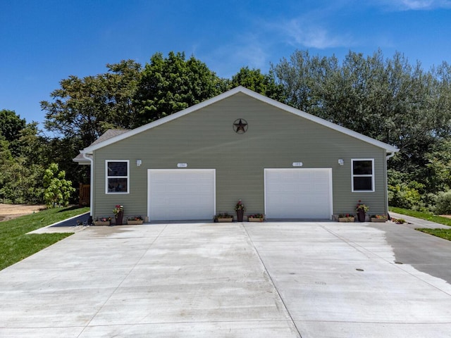 view of property exterior with a garage