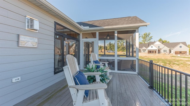 wooden terrace featuring ceiling fan