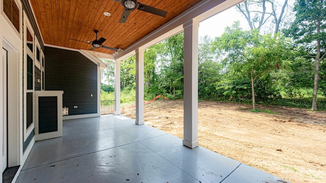 view of patio featuring ceiling fan