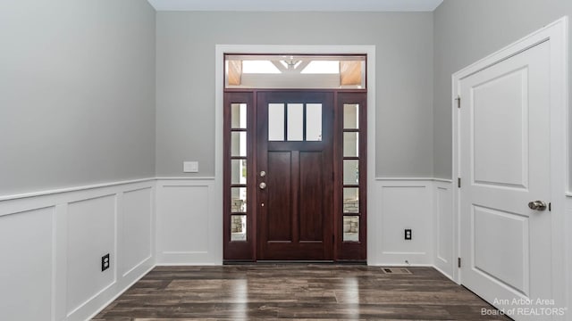 entrance foyer featuring dark hardwood / wood-style flooring