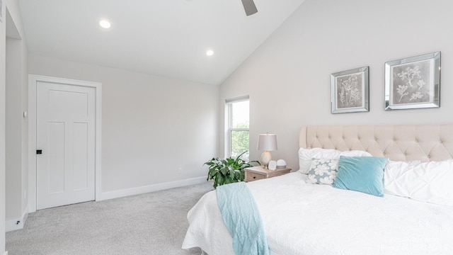 bedroom featuring ceiling fan, high vaulted ceiling, and light carpet