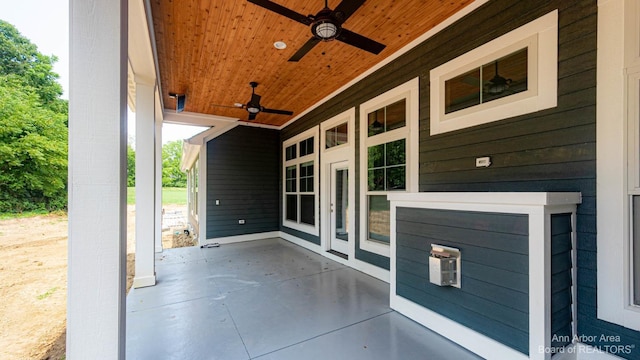 view of patio / terrace with ceiling fan and a porch