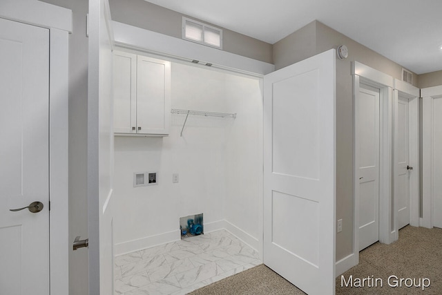 washroom with washer hookup and light carpet