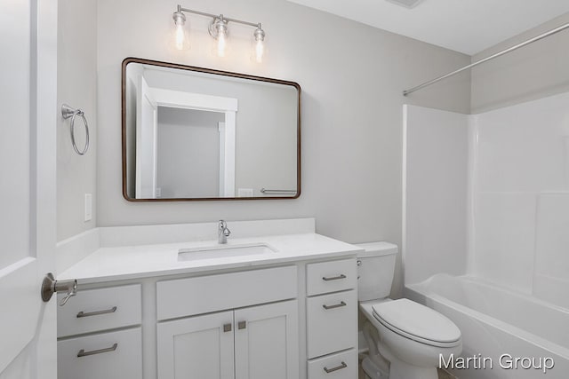 full bathroom featuring toilet, vanity, and shower / bath combination