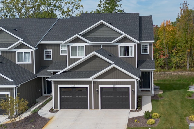 craftsman-style home featuring a garage