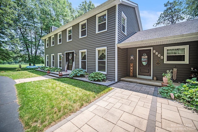 colonial house with a front lawn