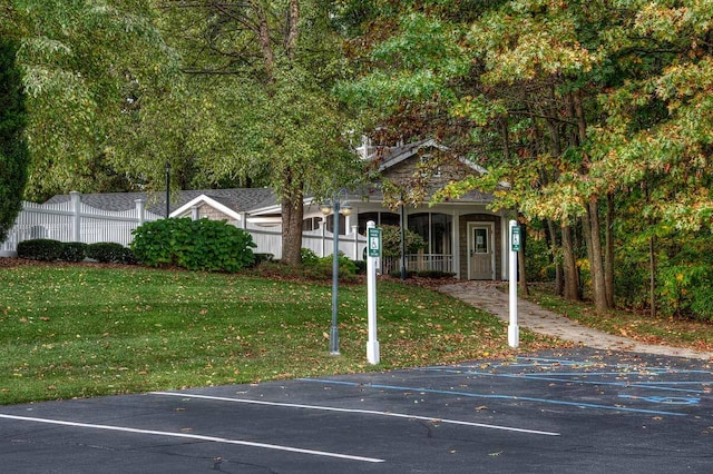 exterior space with a front lawn and covered porch