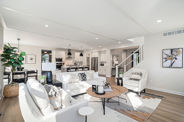 living room with hardwood / wood-style floors