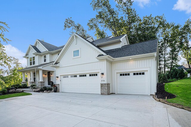 view of front facade with a porch and a garage