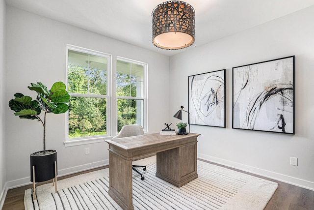 home office with light wood-type flooring