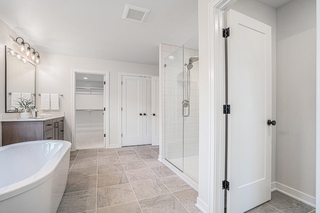 bathroom with vanity and plus walk in shower