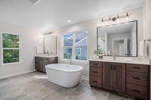 bathroom featuring vanity and plus walk in shower