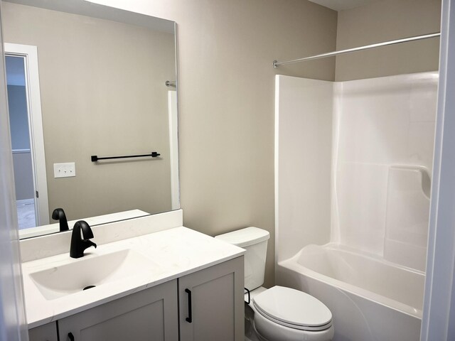 full bathroom with vanity, toilet, and shower / bathtub combination