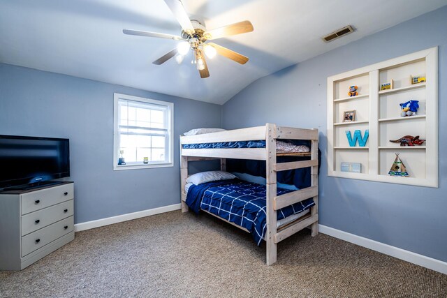 bedroom with lofted ceiling, carpet, and ceiling fan