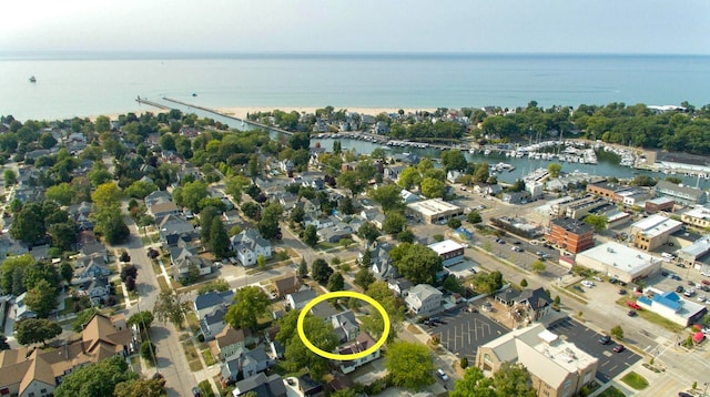 birds eye view of property featuring a water view