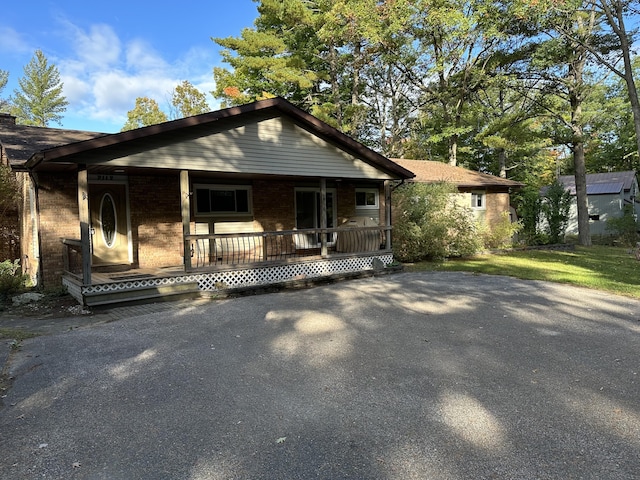 view of front of property featuring covered porch