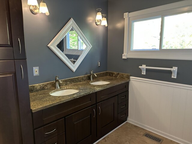 bathroom with vanity and tile patterned floors