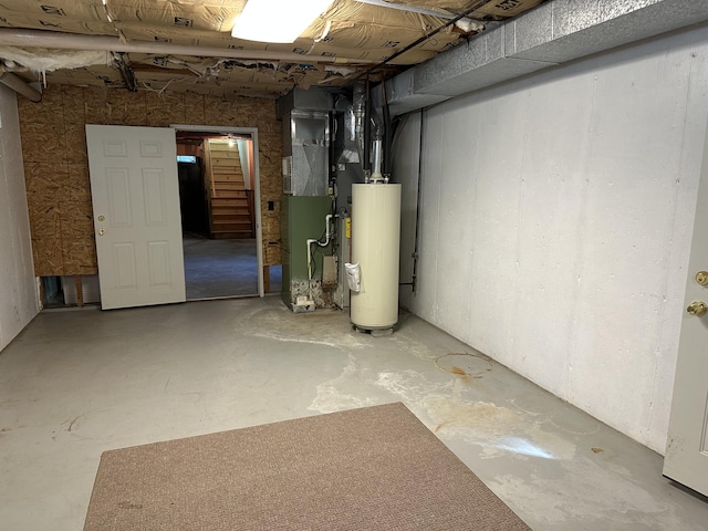 basement with heating unit and gas water heater