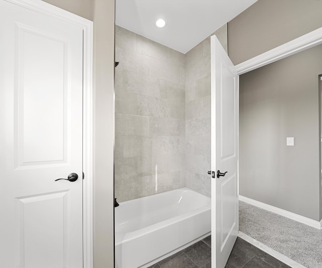 bathroom with shower / bath combination, recessed lighting, and baseboards