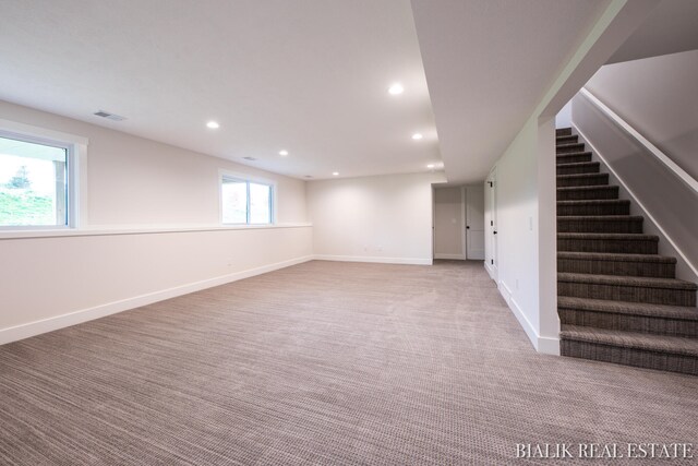 basement featuring carpet flooring