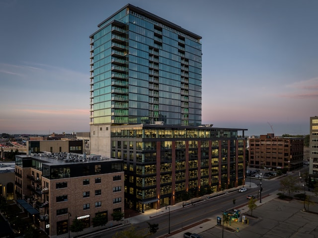 view of outdoor building at dusk