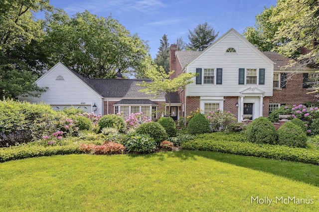 view of front of house with a front yard