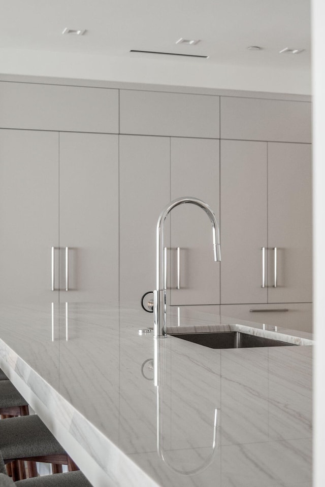 details with sink and white cabinets