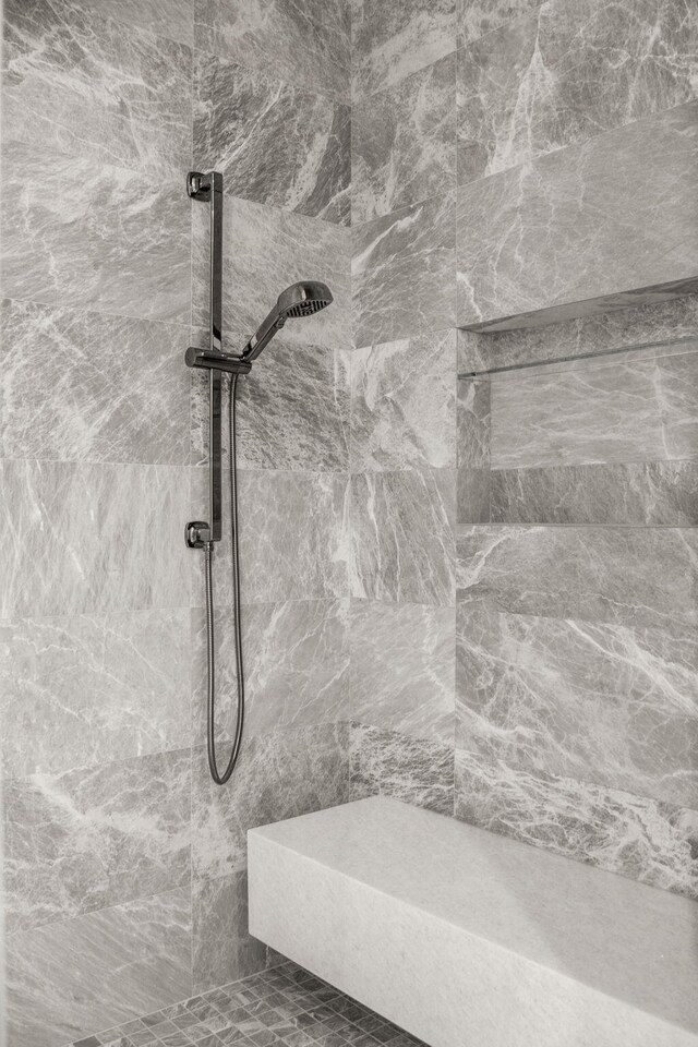 details featuring a tile shower