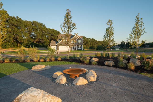 view of patio featuring a garage