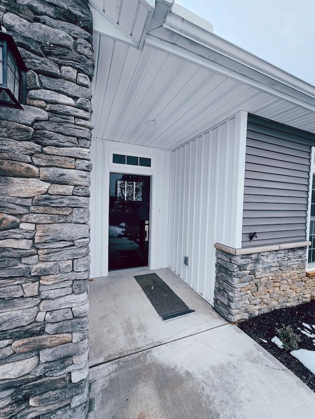 doorway to property with a patio