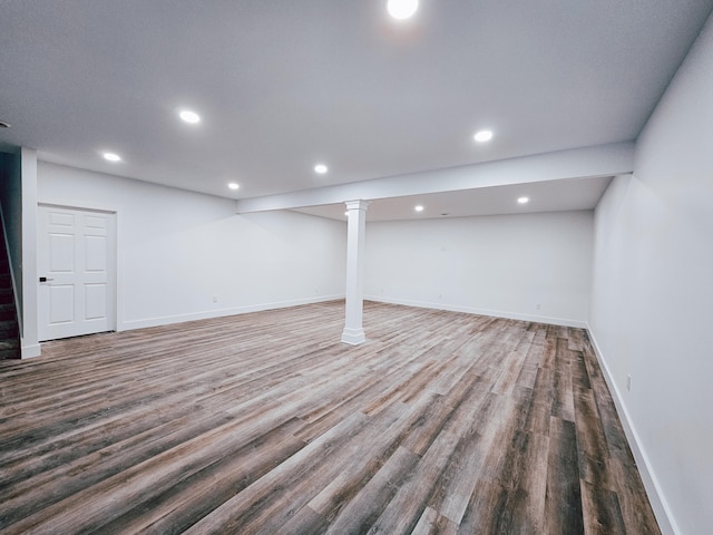 basement featuring hardwood / wood-style floors