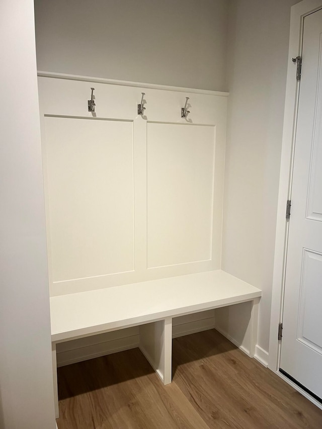 mudroom with hardwood / wood-style flooring