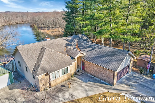 bird's eye view with a water view