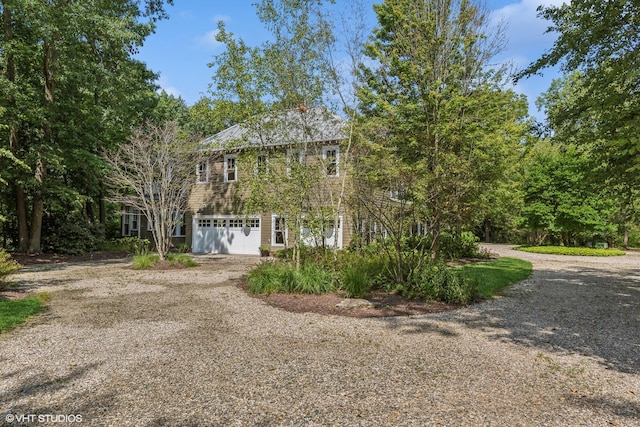 view of front of property featuring a garage