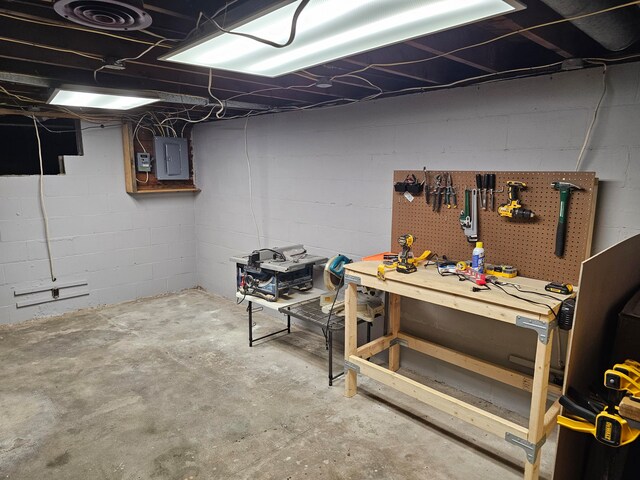 basement with a workshop area