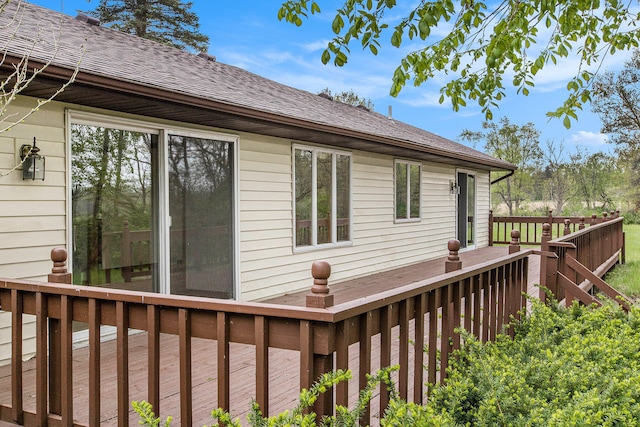 view of side of property with a deck