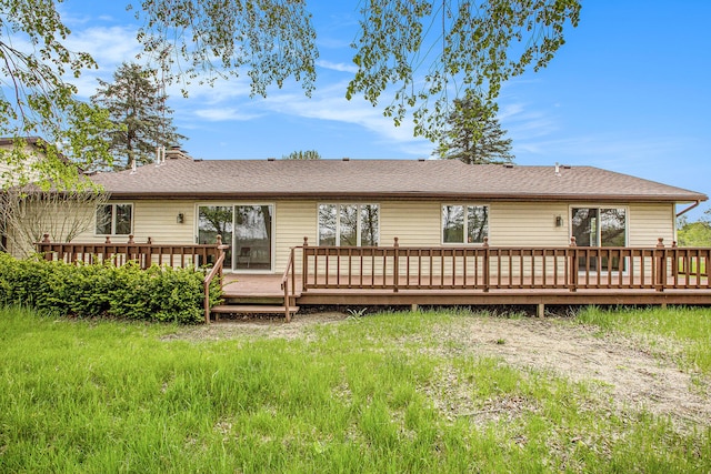 rear view of property with a deck