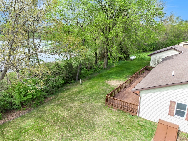 view of yard with a wooden deck