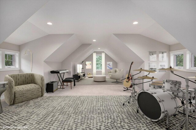 exercise room with a healthy amount of sunlight, lofted ceiling, and light carpet