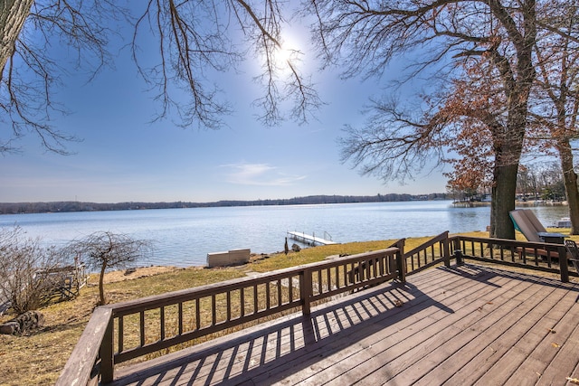 deck featuring a water view