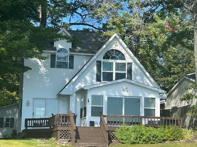 view of front of house featuring a wooden deck