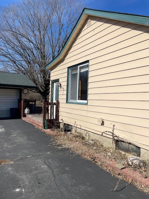 view of home's exterior featuring a garage