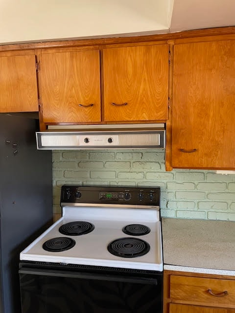 kitchen featuring electric range