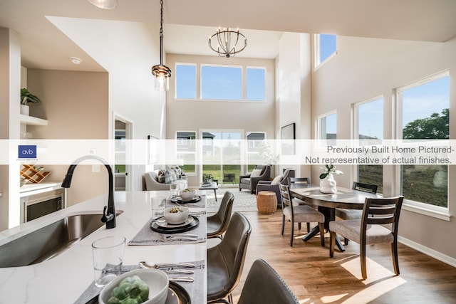 dining space with hardwood / wood-style flooring and a wealth of natural light