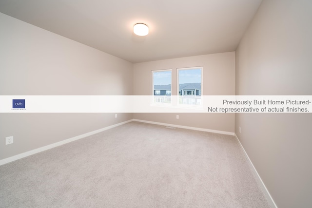 unfurnished room with carpet floors