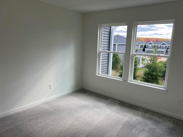 empty room with carpet floors