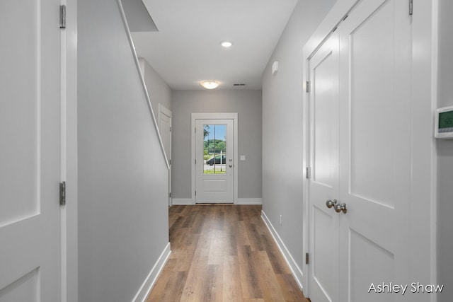 hallway featuring hardwood / wood-style floors