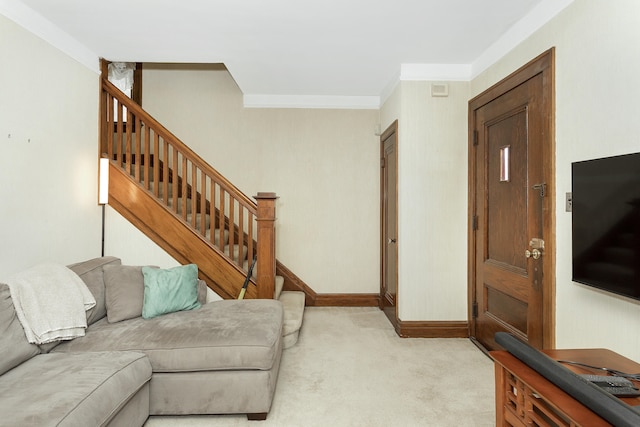 carpeted living room with crown molding