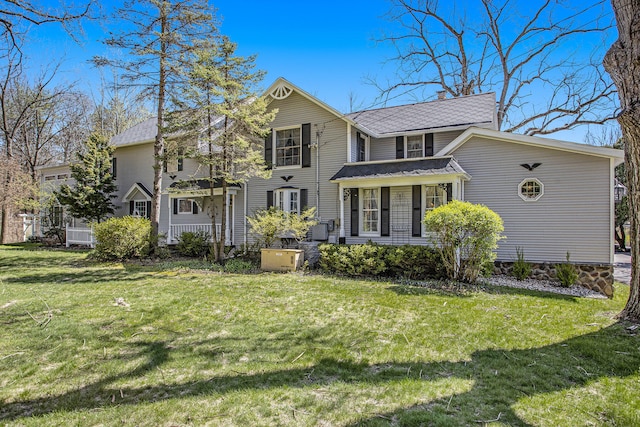 view of property with a front lawn