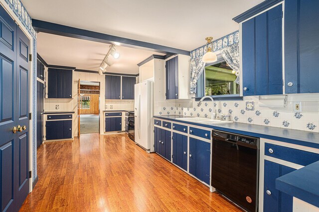 kitchen with black dishwasher, hardwood / wood-style floors, white fridge with ice dispenser, backsplash, and track lighting